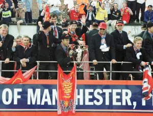 Manchester United Homecoming on open-top bus May 1999 is mobbed by fans at Manchester United Homecoming on open-top bus May 1999 is mobbed by fans at