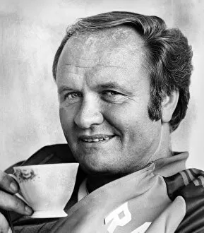 Images Dated 18th August 1984: Manchester United manager Ron Atkinson relaxing in his office at the United training