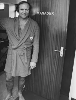 Manchester United manager Ron Atkinson stands at the doorway to the manager'