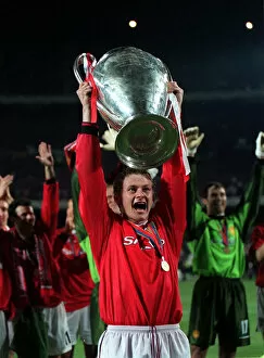 Images Dated 26th May 1999: Manchester United player Ole Gunner Solskjaer May 1999 with the Champions League Cup