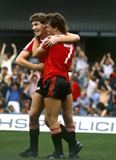 Manchester United players Norman Whiteside and Bryan Robson (7 Manchester United players Norman Whiteside and Bryan Robson (7