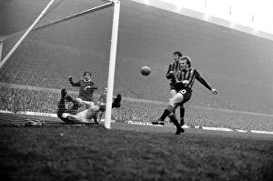 Images Dated 2nd January 1971: Manchester United v. Middlesbrough. F.A. Cup 3rd round. Middlesbrough forward mis-kicks