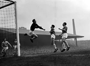Manchester United versus Manchester City-United goalkeeper Harry Gregg clears Manchester United versus Manchester City-United goalkeeper Harry Gregg clears