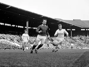 Core61 Gallery: Manchester United versus Strasbourg-Nobby Stiles on the ball. May 1965