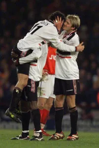 Manchester United winger David Beckham kisses team mate Ryan Giggs after scored in Manchester United winger David Beckham kisses team mate Ryan Giggs after scored in