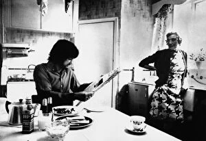 Newspaper Gallery: Manchester Uniteds George Best enjoys breakfast as landlady Mary Fullaway looks