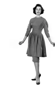 Mannequin Jackie Jackson seen here modeling a summmer dress with matching apron skirt Mannequin Jackie Jackson seen here modeling a summmer dress with matching apron skirt