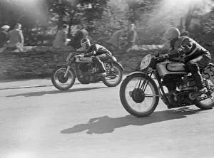 Manx grand Prix Isle of Man 1951 D L Bennett passes K W Swallow in Senior M.G.P Manx grand Prix Isle of Man 1951 D L Bennett passes K W Swallow in Senior M.G.P