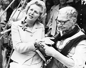 00047 Gallery: Margaret Thatcher having her fortune told by Molly Douglas during a visit to the North