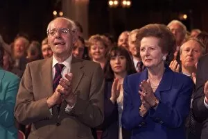 Images Dated 6th October 1999: Margaret Thatcher and husband Denis Thatcher applauding a speech by Lord Archer at
