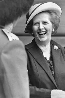 Images Dated 1st May 1985: Margaret Thatcher laughing with a Guards Officer during official ceremony - May 1985