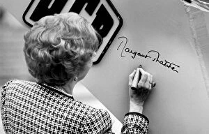 Margaret Thatcher making her signature on side of JCB - June 1987