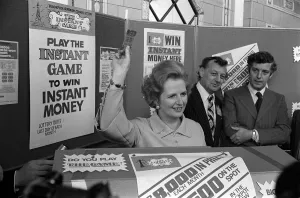 Images Dated 12th October 1977: Margaret Thatcher October 1977 holds up an instant game ticket Conservative Party