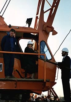 Images Dated 6th December 1989: Margaret Thatcher sitting in a crane in drivers cabin while on an industrial visit