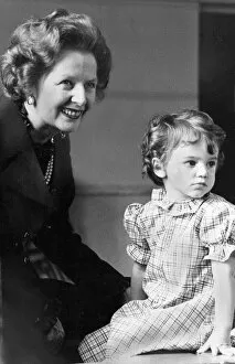 Margaret Thatcher with toddler during visit to Bristol community centre - May 1983