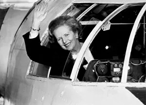 Margaret Thatcher waving from cockpit window during visit to Solent Sky Aircraft Museum