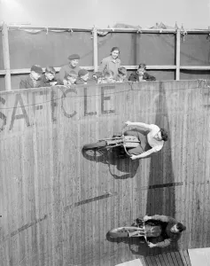 Margy Dare riding a motorbike around the Wall of Death at Morecambe in Lancashire Margy Dare riding a motorbike around the Wall of Death at Morecambe in Lancashire