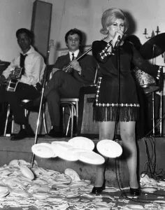 Maria Ikonomidou sings as plates break at her feet 1970 at Elysee Greek Restaurant Maria Ikonomidou sings as plates break at her feet 1970 at Elysee Greek Restaurant
