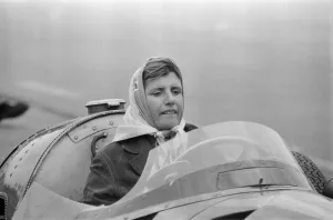 Maria Teresa de Filippis pictured in her Red Maserati 250F before she puts her crash Maria Teresa de Filippis pictured in her Red Maserati 250F before she puts her crash