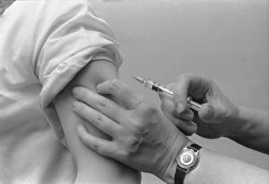 Images Dated 6th June 1979: Marion Pollock, 15, subjuects herself to an injection against German measles (rubella