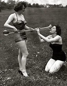 Marjorie Leete aged 18 (black costume) of Sunderland kneeling down drinking a yard of ale Marjorie Leete aged 18 (black costume) of Sunderland kneeling down drinking a yard of ale