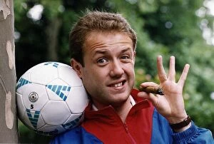 Images Dated 4th July 1990: Mark Burdis Actor Holding football and cigar Dbase A©Mirrorpix