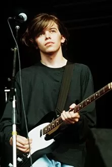 Images Dated 20th August 1990: Mark Gardener singer guitarist with Ride 1990 on stage at Reading Festival