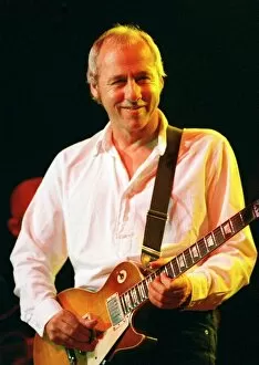 Images Dated 19th May 1997: Mark Knopfler on stage at the Albert Hall in Stirling. Former member of Dire Straits in