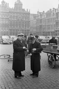 Market scenes in the Grand Place, the central square, Brussels, Belgium. 28th March 1955 Market scenes in the Grand Place, the central square, Brussels, Belgium. 28th March 1955