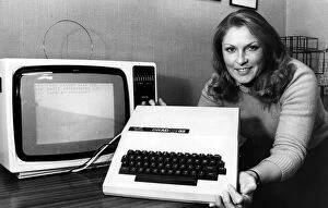 Marketing assistant Wendy Barker with the computer that has filled Dragon'
