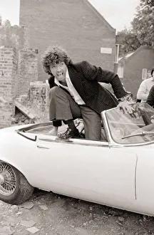 Martin Shaw Jumping out of a white convertable car on the set of The Professionals Martin Shaw Jumping out of a white convertable car on the set of The Professionals