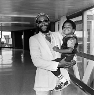 Images Dated 12th June 1980: Marvin Gaye, singer with his son Frankie, aged 4, arriving at London Heathrow Airport
