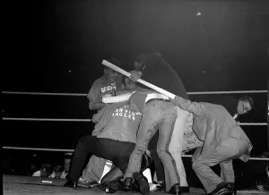 Marvin Hagler under protection after crowd protest 1980 over fight against Alan Marvin Hagler under protection after crowd protest 1980 over fight against Alan
