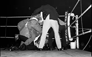 Marvin Hagler is shielded from bottles by referee 1980 after beating Alan Minter in Marvin Hagler is shielded from bottles by referee 1980 after beating Alan Minter in