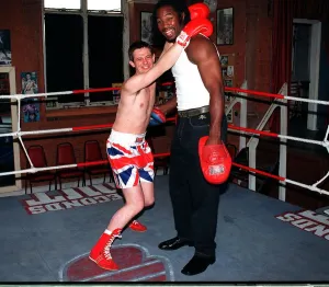 Images Dated 24th July 1997: Matthew Wright boxer Lennox Lewis in london gym july 1997