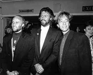 Maurice, Barry and Robin Gibb of the Bee Gees pop group at London' Maurice, Barry and Robin Gibb of the Bee Gees pop group at London'