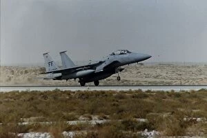A McDonnell Douglas F15 Eagle of the USAF lands on a desert runway during the Gulf War