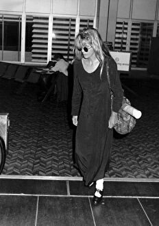 Images Dated 29th August 1991: Meg Ryan Actress leaving Heathrow Airport for Los Angeles