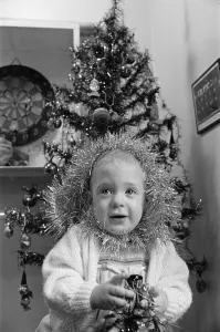 Meltham Fire Station Christmas party - young girl with tinsel wrapped round her head Meltham Fire Station Christmas party - young girl with tinsel wrapped round her head