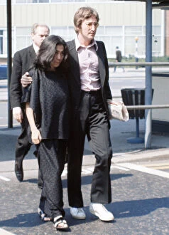 Images Dated 3rd May 1971: Former member of The Beatles pop group John Lennon with his wife Yoko Ono at Heathrow