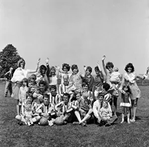 Members of the Torpedo Football Team at Reading with their wives and children Members of the Torpedo Football Team at Reading with their wives and children
