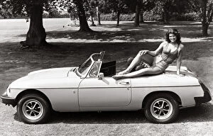 Images Dated 23rd February 2005: MGB Convertable Sport 1975 - Motors - Motor Cars Car sexy model posing on top