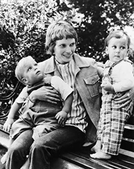 Mia Farrow Actress with her two sons Sascha Villiers and Matthew Phineas sitting on park