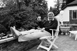 Images Dated 31st May 1988: Michael Aspel relaxes at home. 31st May 1988