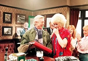 Images Dated 1st February 1990: Michael Aspel TV Presenter of This is your Life surprising Liz Dawn of coronation street
