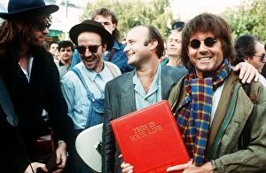 Images Dated 20th September 1988: Michael Aspel TV Presenter surprises Phil Collins for the show This is your Life with