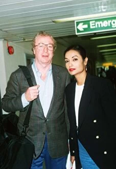 Michael Caine Film Actor with his wife at London Airport