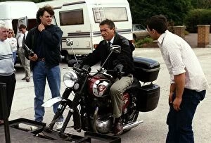 Images Dated 7th September 1989: Michael Elphick Actor sitting on a BSA Motor Cycle during the filming of an episode of