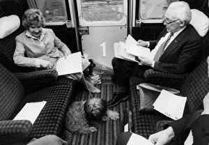 Michael Foot and wife Jill Craigie on train with their dog - May 1983 Michael Foot and wife Jill Craigie on train with their dog - May 1983