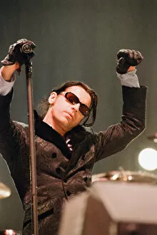 Images Dated 28th June 2011: Michael Hutchence lead singer of INXS, pictured in concert - Elegantly Wasted World Tour